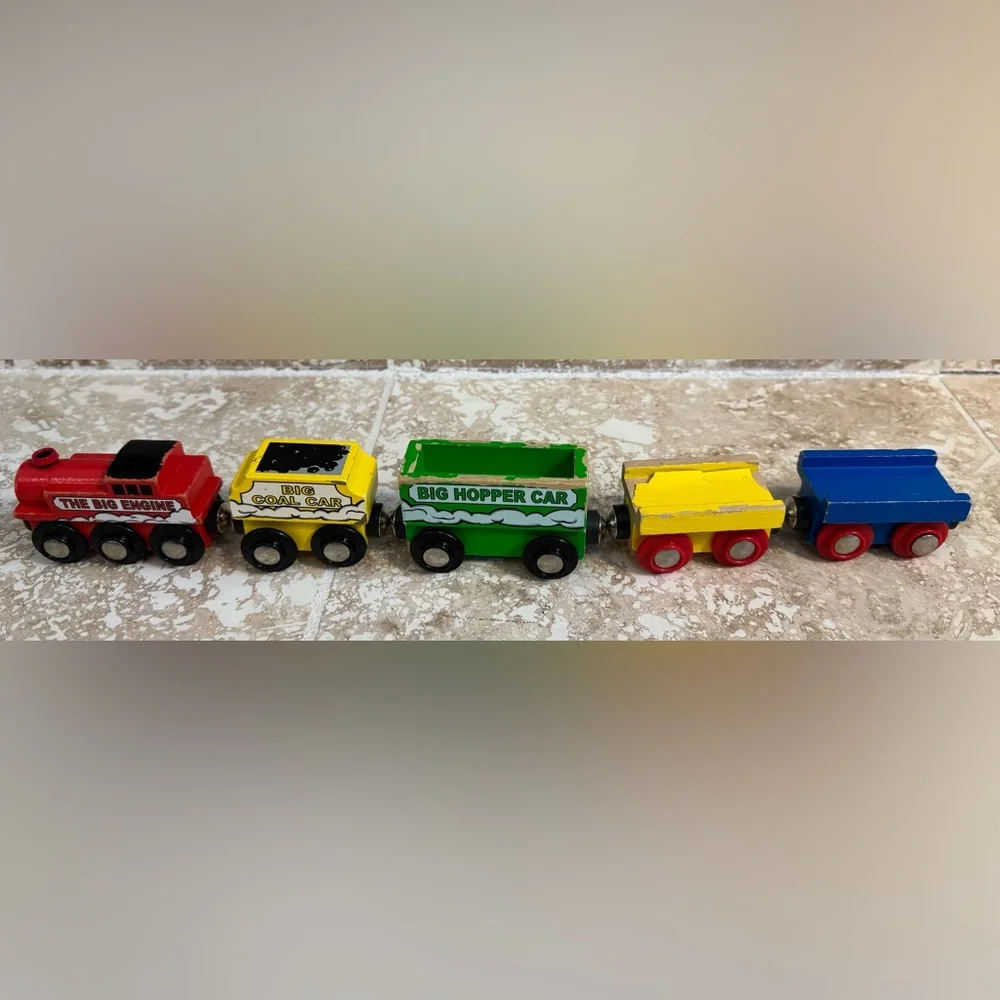 5 wooden train cars (including engine) compatible with Brio and Thomas.